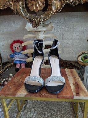 Le Chateau Black and White Ankle Strap Dress Sandals